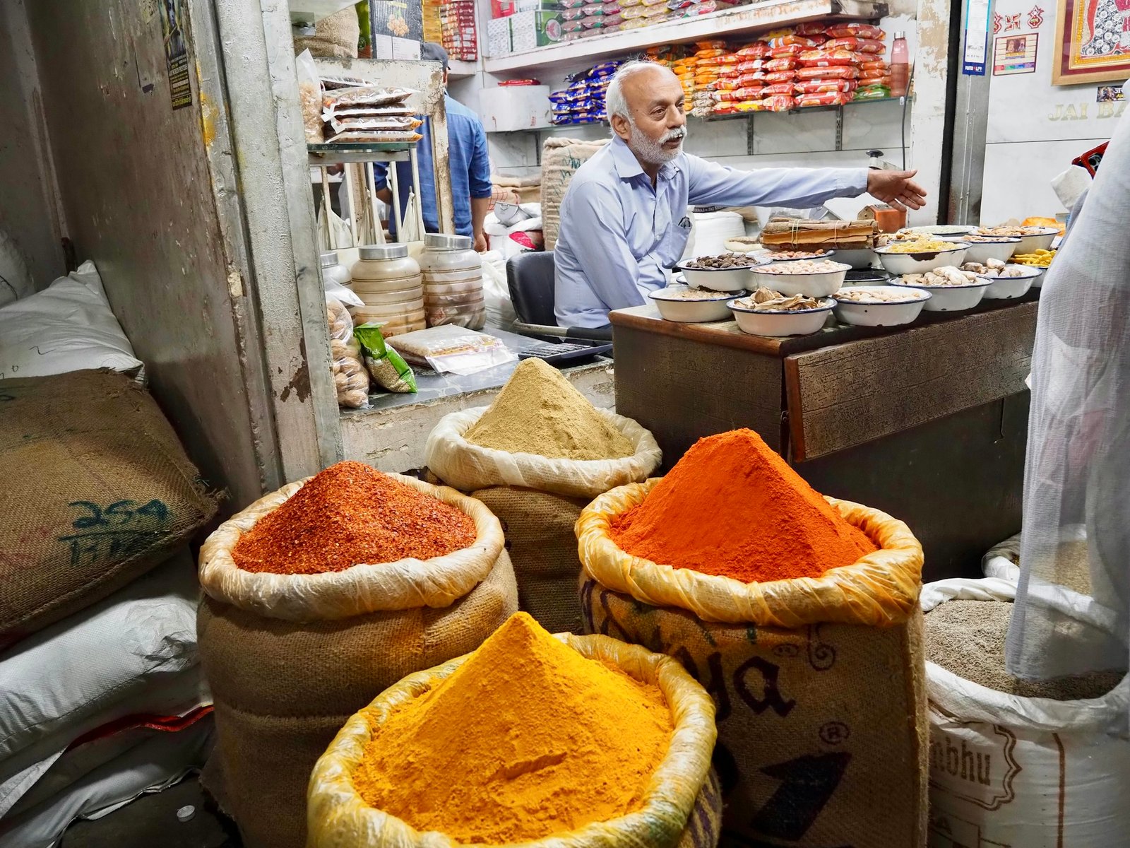 Ground spices in open sacks at an Indian spice market